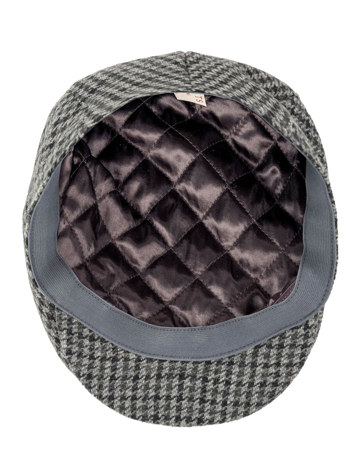 Dents Blashford men's charcoal dogtooth tweed flat cap, underside showing quilted satin lining