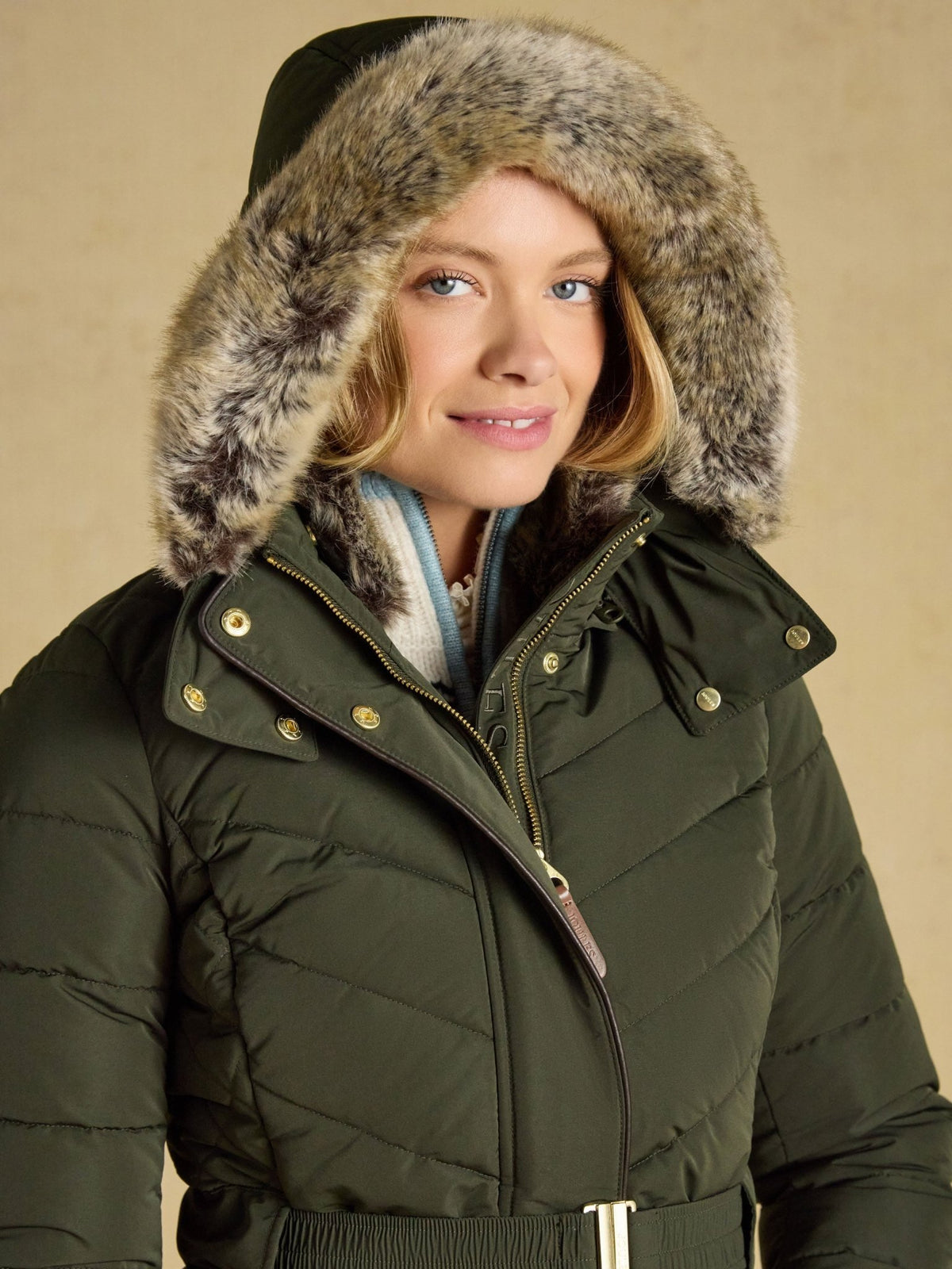 Joules Aspen long ladies showerproof padded coat in green with faux fur hood, view 4