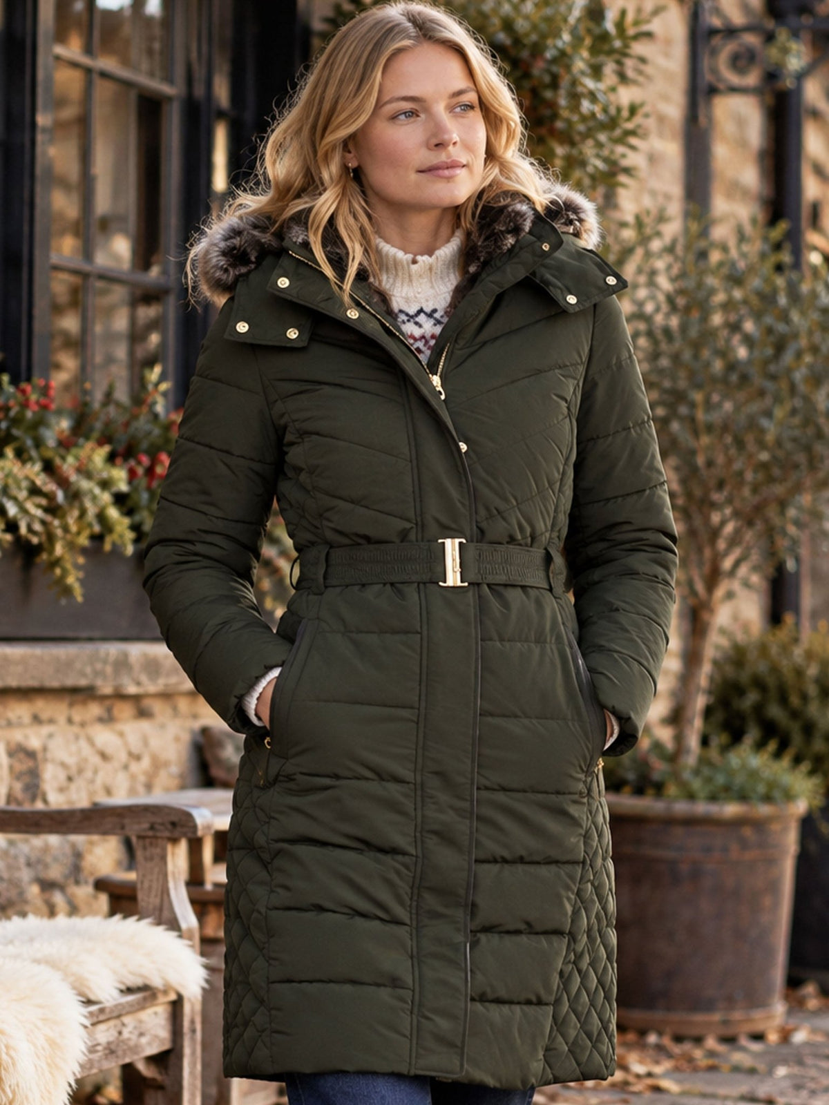 Joules Aspen long ladies showerproof padded coat in green with faux fur hood, view 1