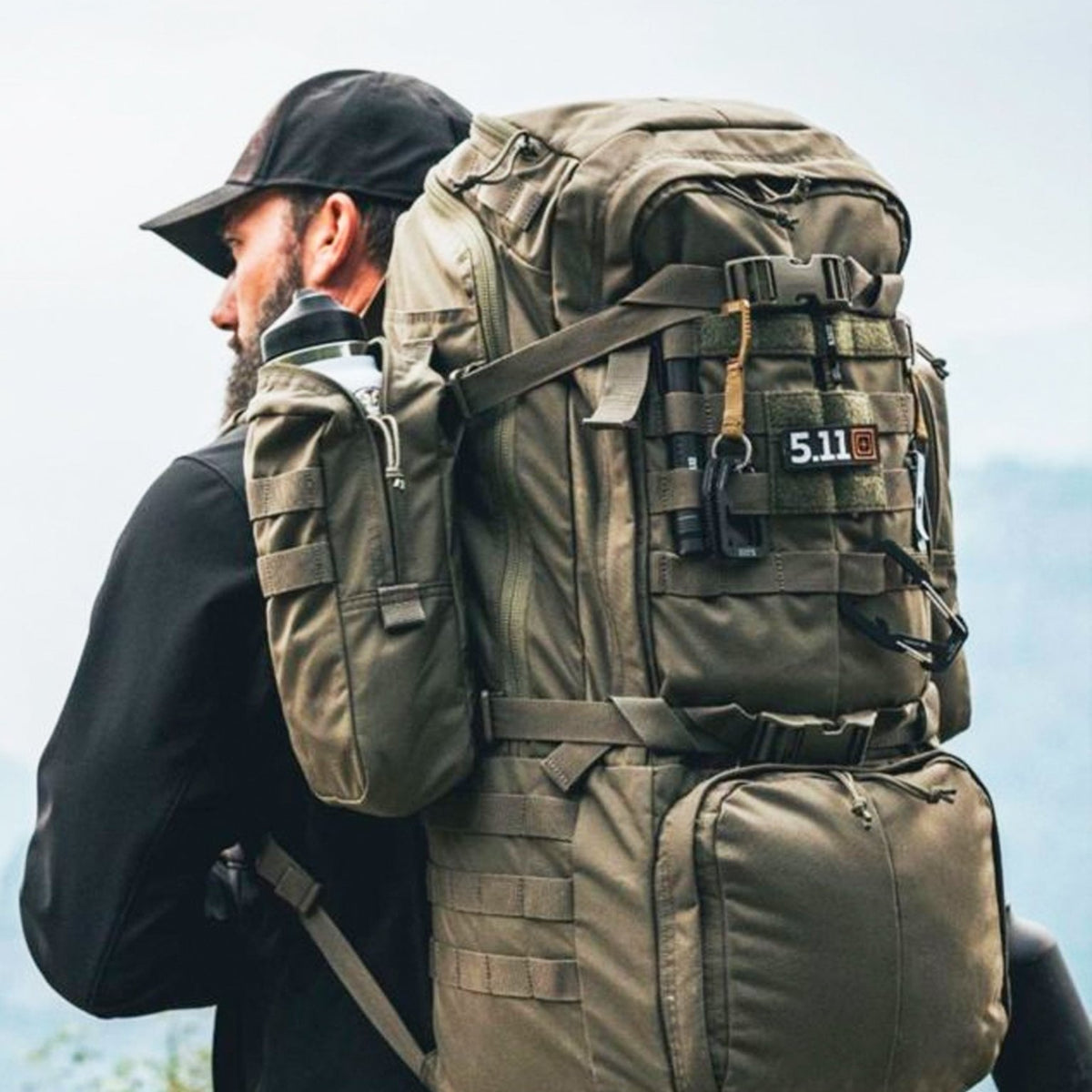 Hiker wearing the 5.11 Rush 100 backpack 60L outdoors