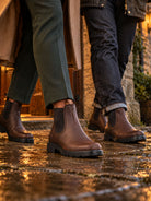 Blundstone 2340 brown oiled nubuck Chelsea boots worn on a wet cobbled path