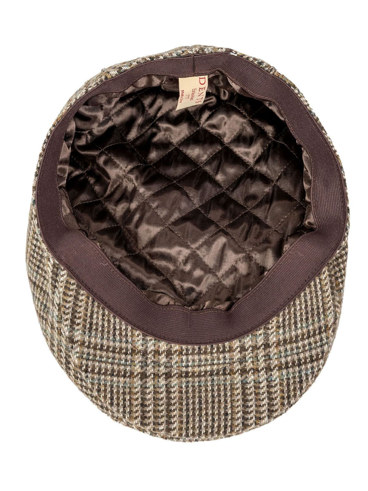 Inside of the Dents glen plaid tweed flat cap showing the quilted satin lining