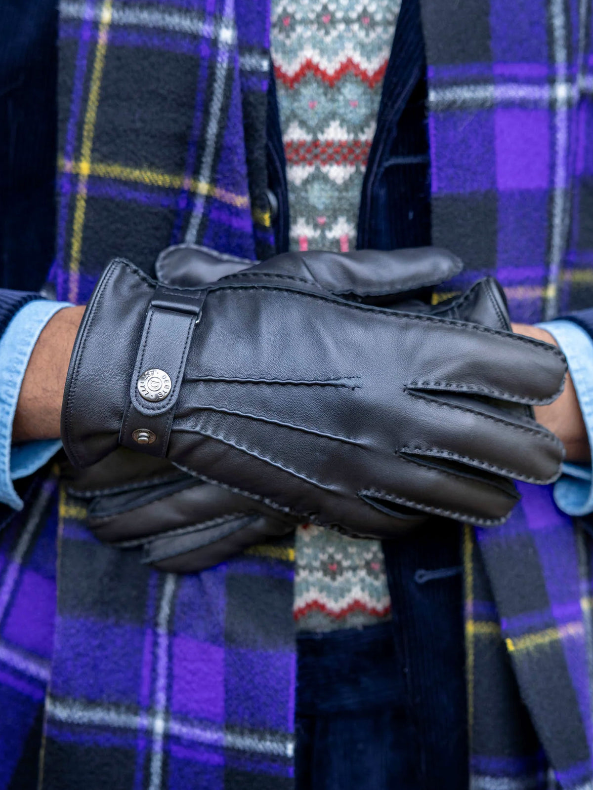 Dents Tetbury black leather gloves, worn with navy coat and purple tartan scarf