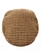 Dents Blashford men's chestnut dogtooth tweed flat cap, top view