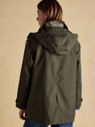 Joules Rainmore womens waterproof raincoat in green, back view with hood and check collar lining