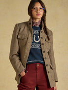 Joules Saddlebury women's brown herringbone tweed hacking jacket, full-length front view styled with a navy jumper