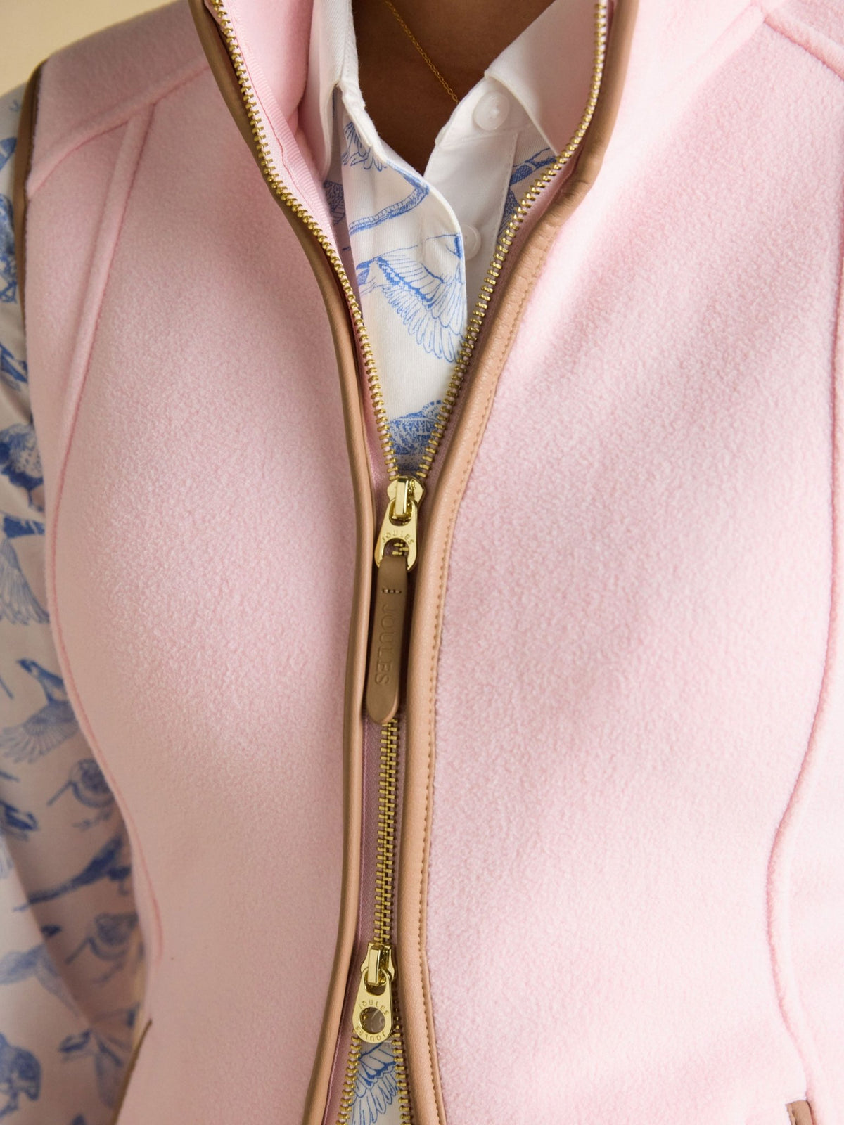 Light Pink Joules women's fleece gilet with faux leather trim and stand collar