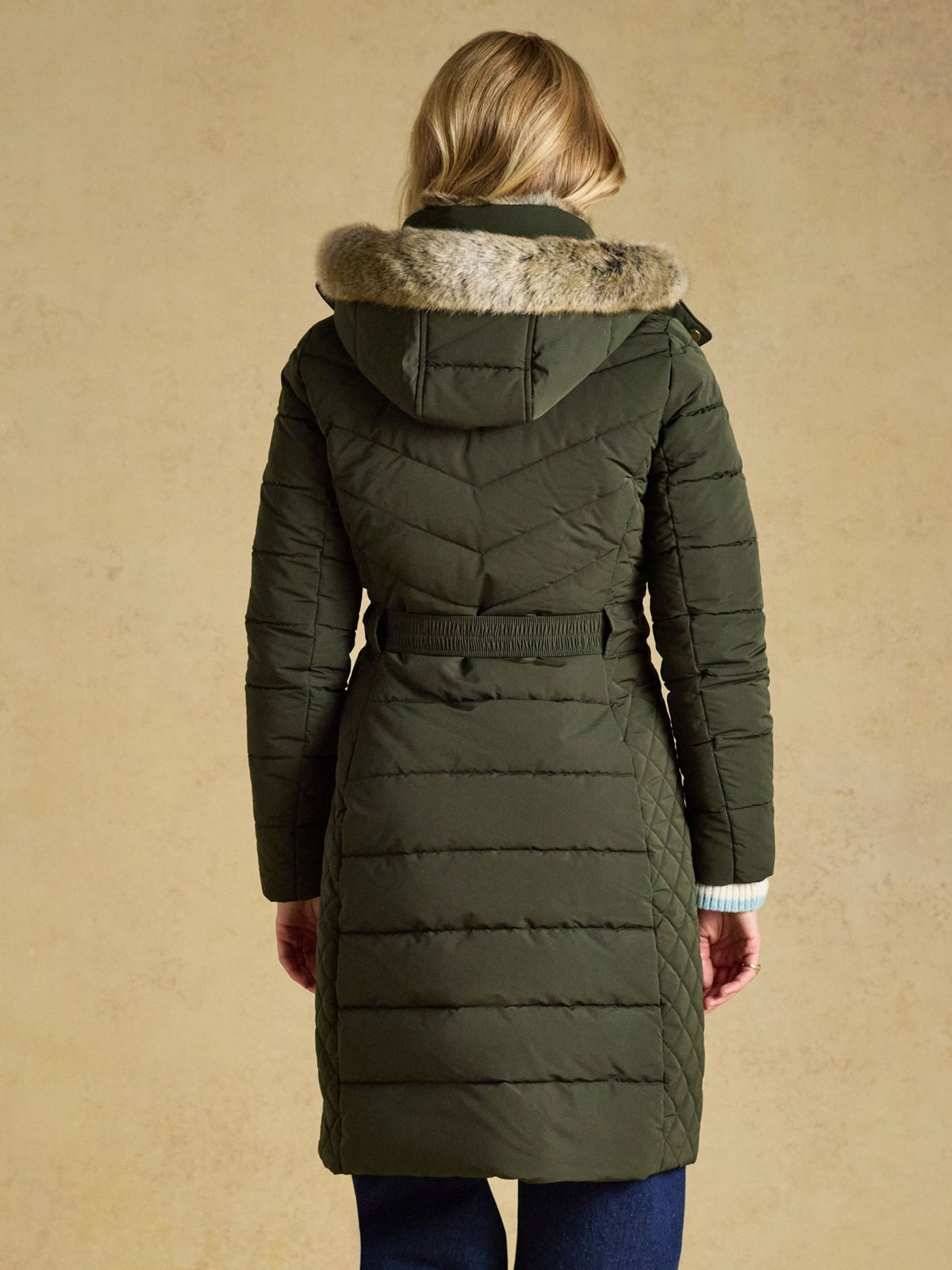 Joules Aspen long ladies showerproof padded coat in green with faux fur hood, view 3