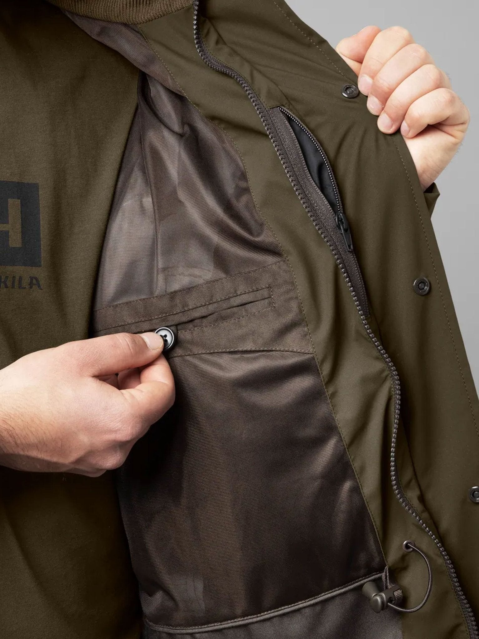 Harkila Orton tech HWS Waterproof mens jacket / Coat with packable hood Harkila