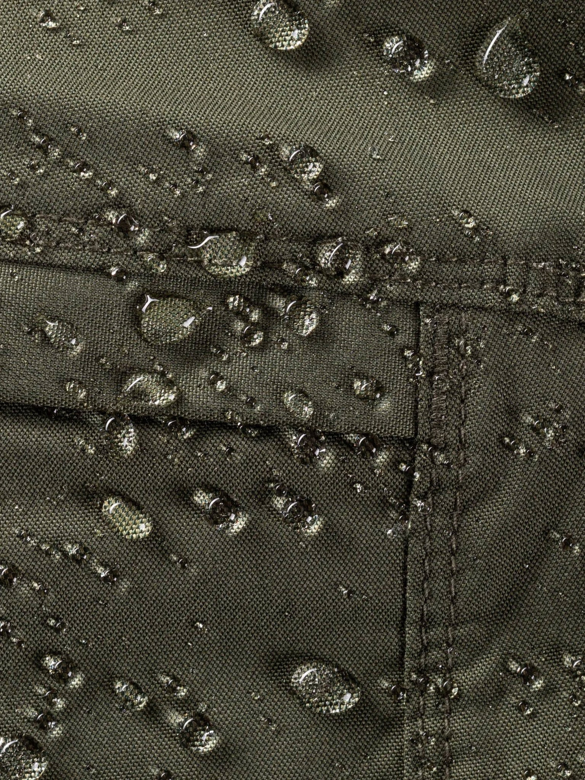 5.11 Tactical Apex Pant in olive green - close up of water-repellent Teflon finished fabric